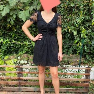 Jack. Black lace mid-thigh dress.